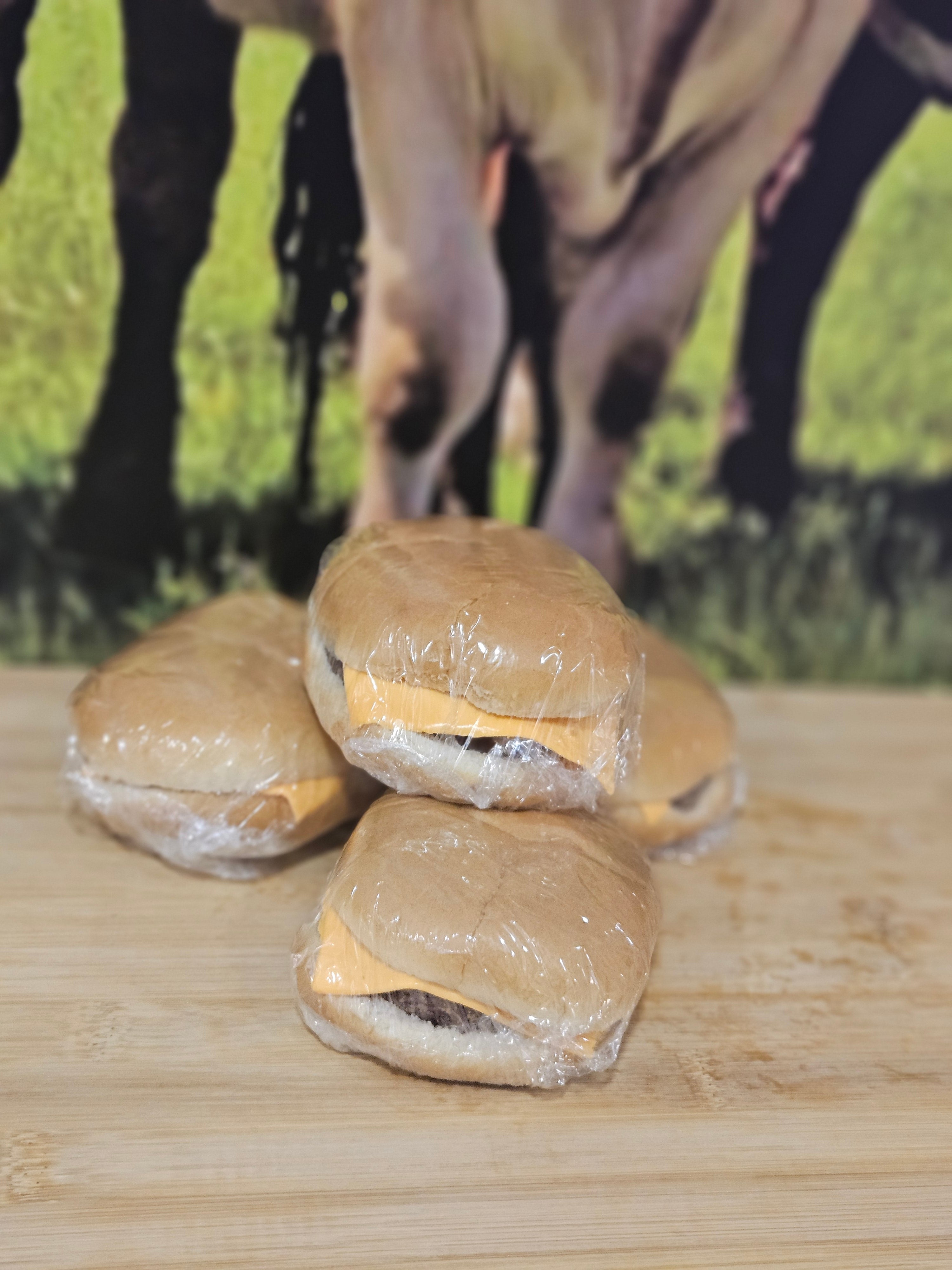 Cheese burger cooked £2.39 (each)